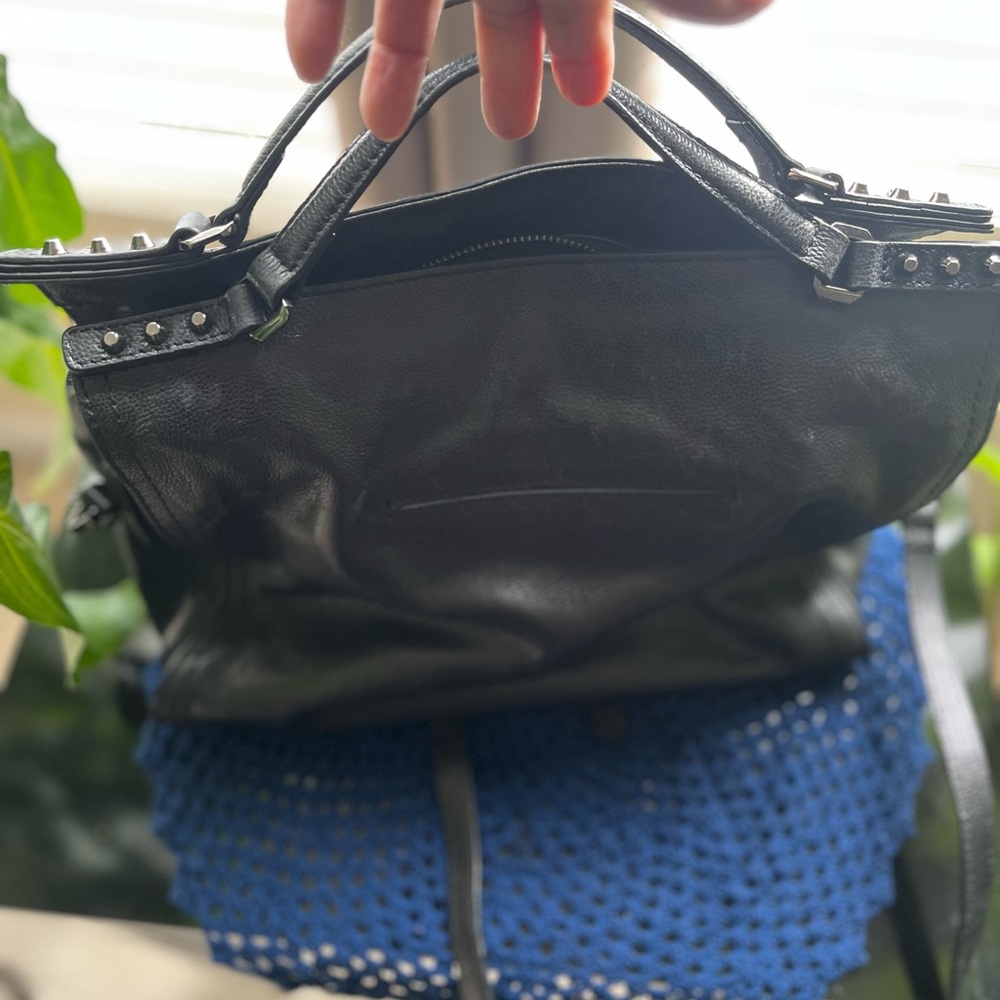 Excellent bag-very versatile. You can use as a clutch or a handbag.